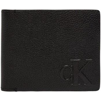 Lompakot Calvin Klein Jeans  LOGO EMBOSS BIFOLD W/COIN K50K512594  Yks...