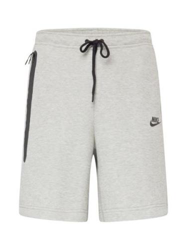 Nike Sportswear Housut  meleerattu harmaa / musta