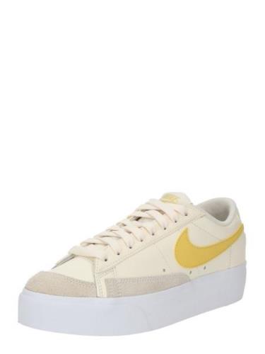 Nike Sportswear Matalavartiset tennarit 'Blazer'  norsunluu / tummabei...