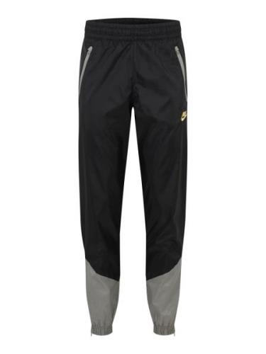 Nike Sportswear Housut  vaaleankeltainen / harmaa / musta