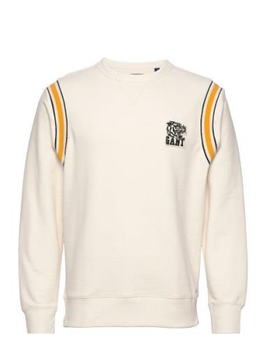 D2. Tiger Badge C-Neck Sweat Cream GANT